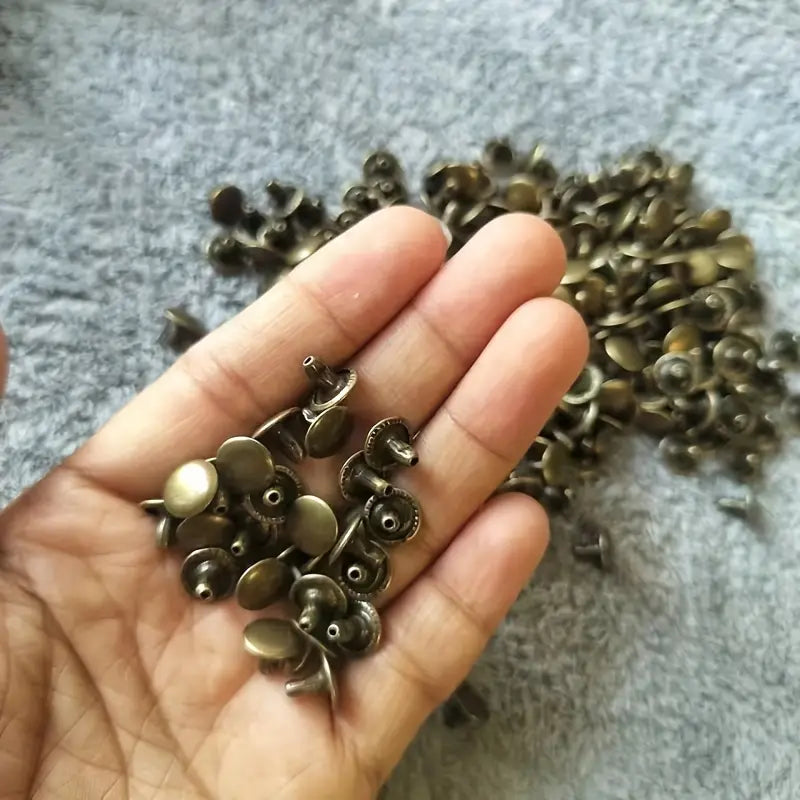Remaches doble cabeza color bronce 50 unidades
